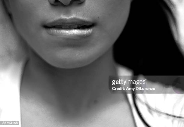 self  portrait - female biting lips stockfoto's en -beelden