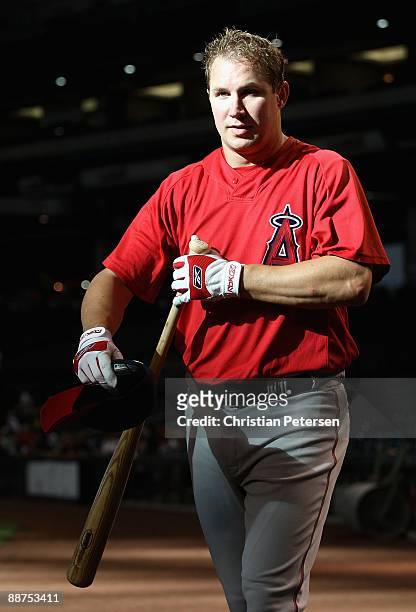 Robb Quinlan of the Los Angeles Angels of Anaheims warms up before the major league baseball game against the Arizona Diamondbacks at Chase Field on...