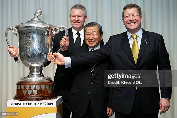 New Zealand Rugby Union CEO Steve Tew, Japan Rugby Football Union Vice President Noboru Mashimo and Australian Rugby Union Deputy CEO Matt Carroll...