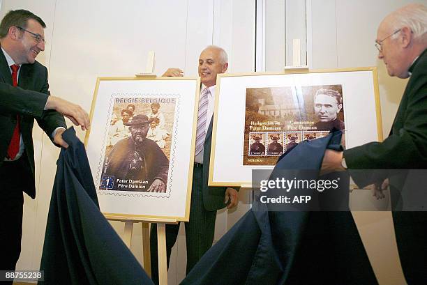 Belgian Minister of Public Enterprises Steven Vanackere, CEO of the Belgian Post Johnny Thijs and Cardinal Godfried Danneels unveil the prototype for...