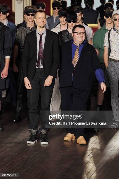 Designer Lucas Ossendrijver and Alber Elbaz walk the runway during the Lanvin fashion show at Paris Fashion Week Menswear Spring/Summer 2010 on June...