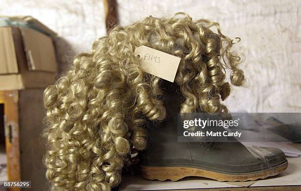 Wig and a single wellie boot that was handed into the Glastonbury Festival Lost Property office waits to be claimed at the Glastonbury Festival site...