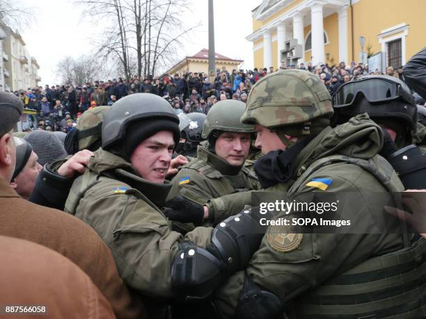 Members of National Guard try to keep crowds under control during the demonstration for release of Mikheil Saakashvili. Saakashvili's supporters...
