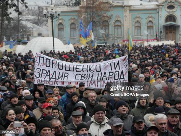 The crowd listens to Mikheil Saakashvili's speech in front of the parliament after his release from brief detainment. Saakashvili's supporters gather...