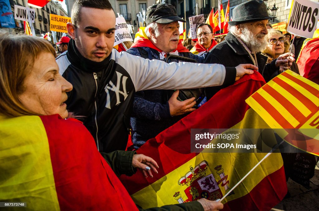 A young Spanish unionist seen  showing a Spanish flag. Spain...