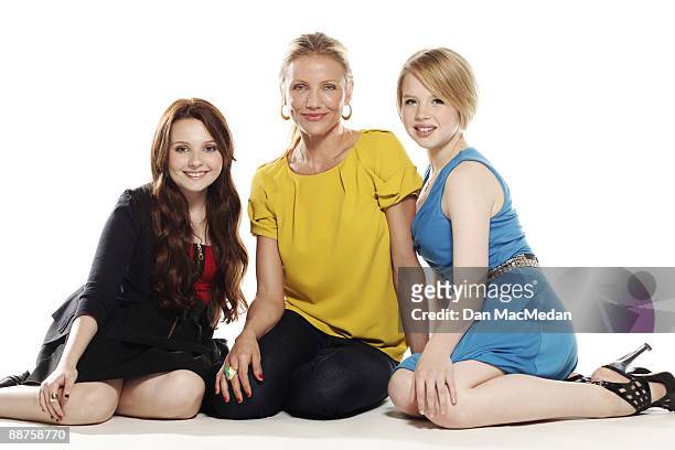 Cameron Diaz, Abigail Breslin and Sofia Vassilieva pose at a portrait session in Santa Monica, CA.