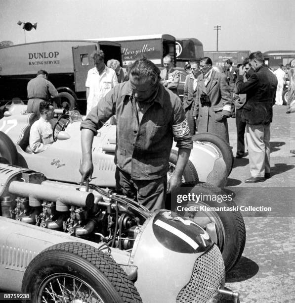 The British Grand Prix; Silverstone, May 13, 1950. Work in the Paddock on cars of the Talbot-Lago team. The nearest is the T26C entered and driven by...