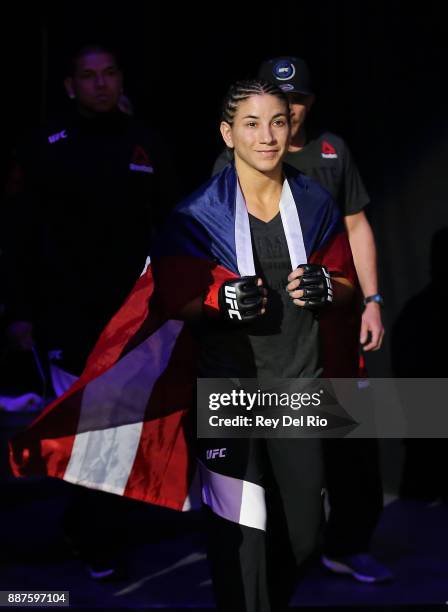 Tecia Torres walks out into the arena to face Michelle Waterson during the UFC 218 event at Little Caesars Arena on December 2, 2017 in Detroit,...