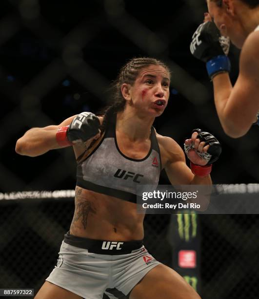 Tecia Torres battles Michelle Waterson during the UFC 218 event at Little Caesars Arena on December 2, 2017 in Detroit, Michigan.