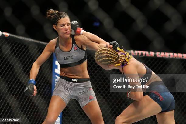 Felice Herrig punches Cortney Casey during the UFC 218 event at Little Caesars Arena on December 2, 2017 in Detroit, Michigan.