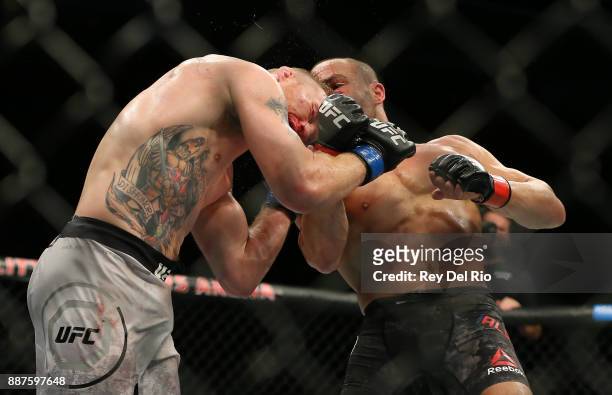 Eddie Alvarez punches Justin Gaethje during the UFC 218 event at Little Caesars Arena on December 2, 2017 in Detroit, Michigan.