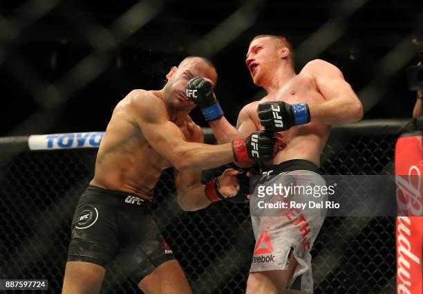 Justin Gaethje punches Eddie Alvarez during the UFC 218 event at Little Caesars Arena on December 2, 2017 in Detroit, Michigan.