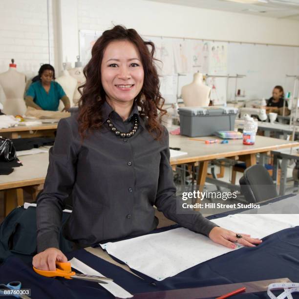 asian fashion design student working in classroom - person of colour stock pictures, royalty-free photos & images