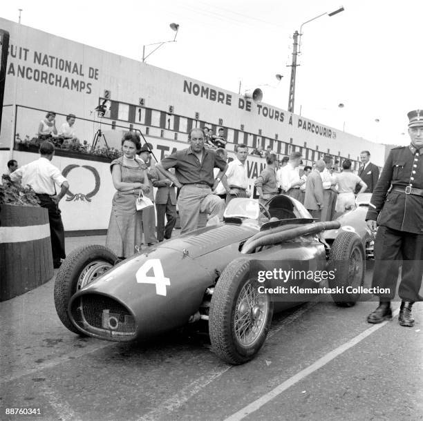 The Belgian Grand Prix; Spa-Francorchamps, June 20, 1954. The Ferrari 'Squalo' before the start with its designer, Aurelio Lampredi, watching over...