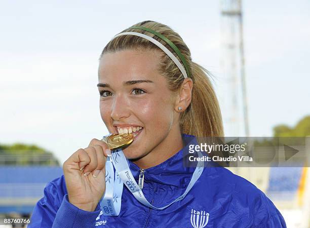Gold medalist Silvia Salis of Italy poses for the photographesr after the victory of Women's Hammer Throw Final during the XVI Mediterranean Games on...