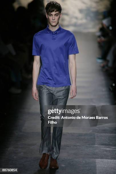 Model walks the runway at the Paul Smith fashion show during Paris Menswear Fashion Week Spring/Summer 2010 at Couvent des Cordeliers on June 28,...