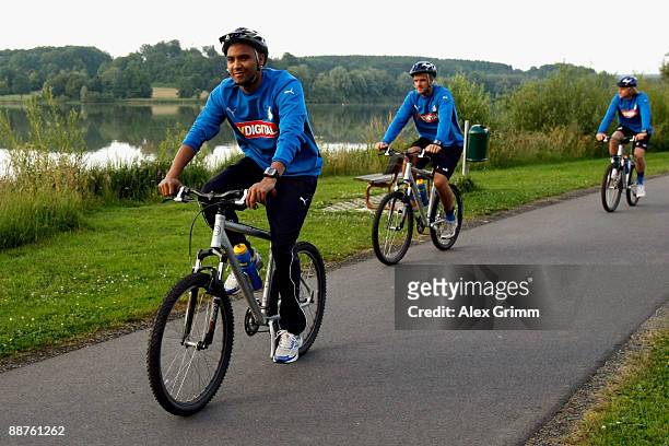 Marvin Compper and team mates drive their bicycles during a training camp of 1899 Hoffenheim on June 30, 2009 in Stahlhofen am Wiesensee, Germany.