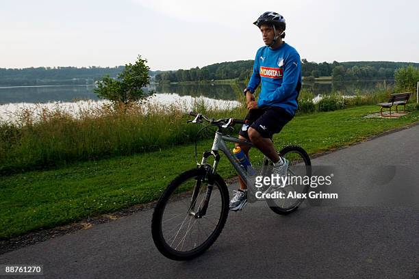Carlos Eduardo drives his bicycle during a training camp of 1899 Hoffenheim on June 30, 2009 in Stahlhofen am Wiesensee, Germany.