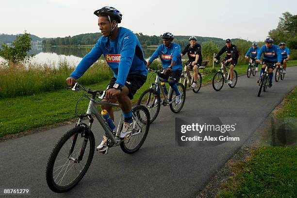 Wellington and team mates drive their bicycles during a training camp of 1899 Hoffenheim on June 30, 2009 in Stahlhofen am Wiesensee, Germany.