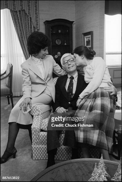 In his brother's apartment, American politician US Congressman John B Anderson smiles as his daughter Diane kisses him on the cheek while his wife...