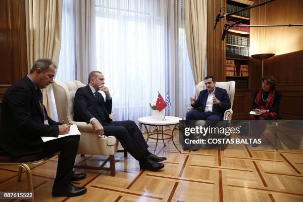 Greek Prime Minister Alexis Tsipras meets with Turkish President Tayyip Erdogan at the Maximos Mansion in Athens on December 7, 2017. President Recep...