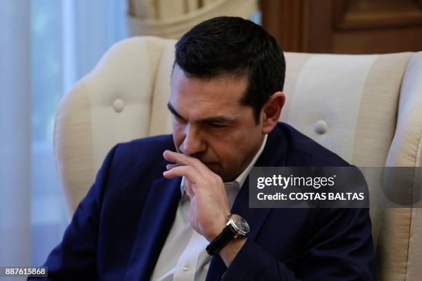 Greek Prime Minister Alexis Tsipras meets with Turkey's president at the Maximos Mansion in Athens on December 7, 2017. President Recep Tayyip...