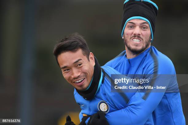 Yuto Nagatomo and Davide Santon of FC Internazionale joking during an FC Internazionale training session at Suning Training Center at Appiano Gentile...