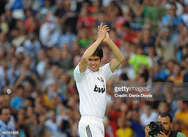 New signing Kaka waves to fans during his official presentation as a Real Madrid player at the Santiago Bernabeu Stadium on June 30, 2009 in Madrid,...