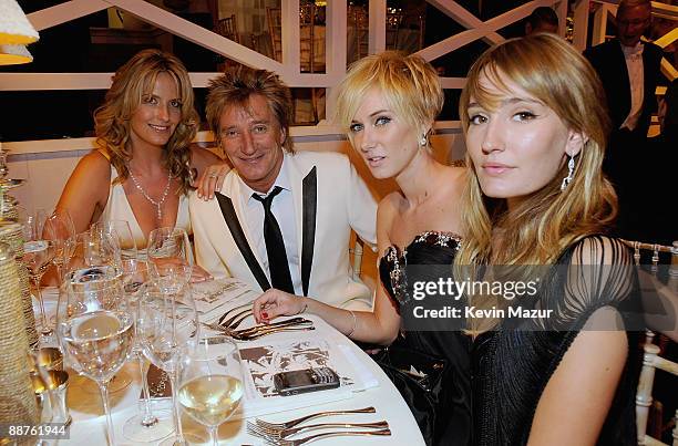 Singer Rod Stewart with daughters Kimberley, wearing a diamond drop earrings set with 2 beautiful brilliant cut diamonds , a bangle bracelet entirely...