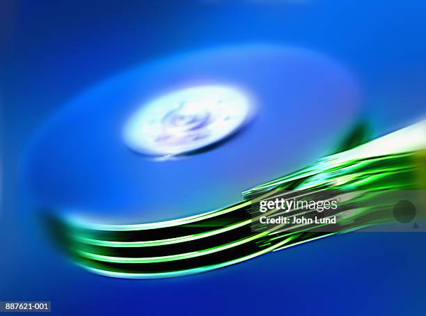 computer hard drive read/write heads (digital enhancement) - festplatte stock-fotos und bilder