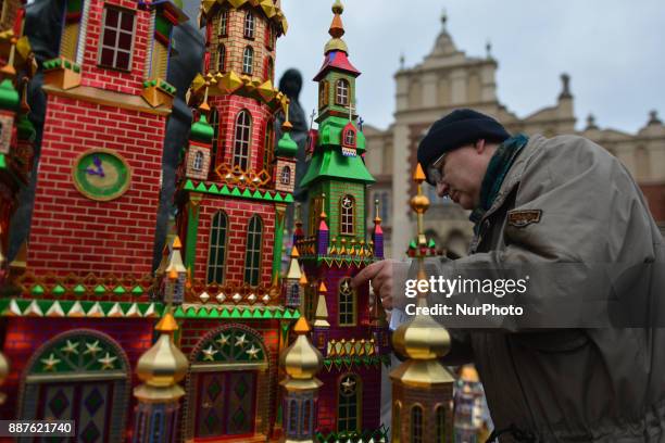 Man fixes the Nativity Scene on display in Krakow's Main Square, during the 75th Nativity Scene Contest. On Thursday, 7 December 2017, in Krakow,...