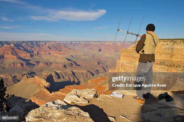 researcher from the peregrine fund using radio tracking equipment to study the california condor, grand canyon np, arizona, usa - erosional stock pictures, royalty-free photos & images