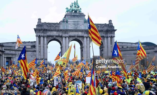 People with Catalan 'Estelada' flags stage a pro-independence demonstration on December 7, 2017 in Brussels, Belgium. Organised by pro-independence...