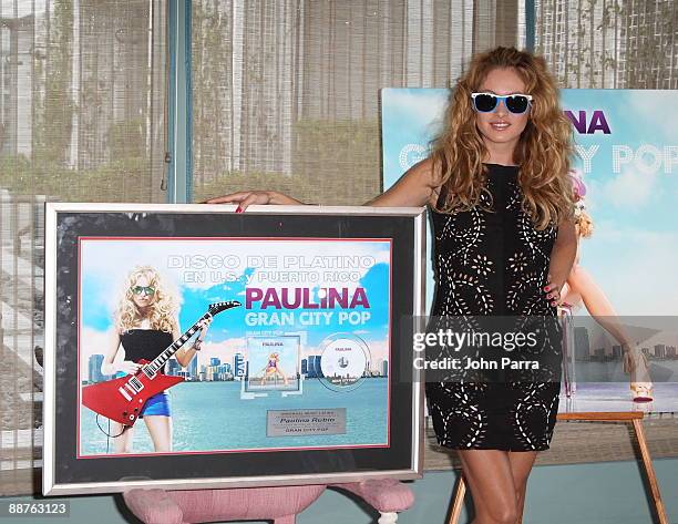 Singer Paulina Rubio attends a press conference for her new CD release Gran City Pop at Club 50 at Viceroy Miami on June 30, 2009 in Miami, Florida.