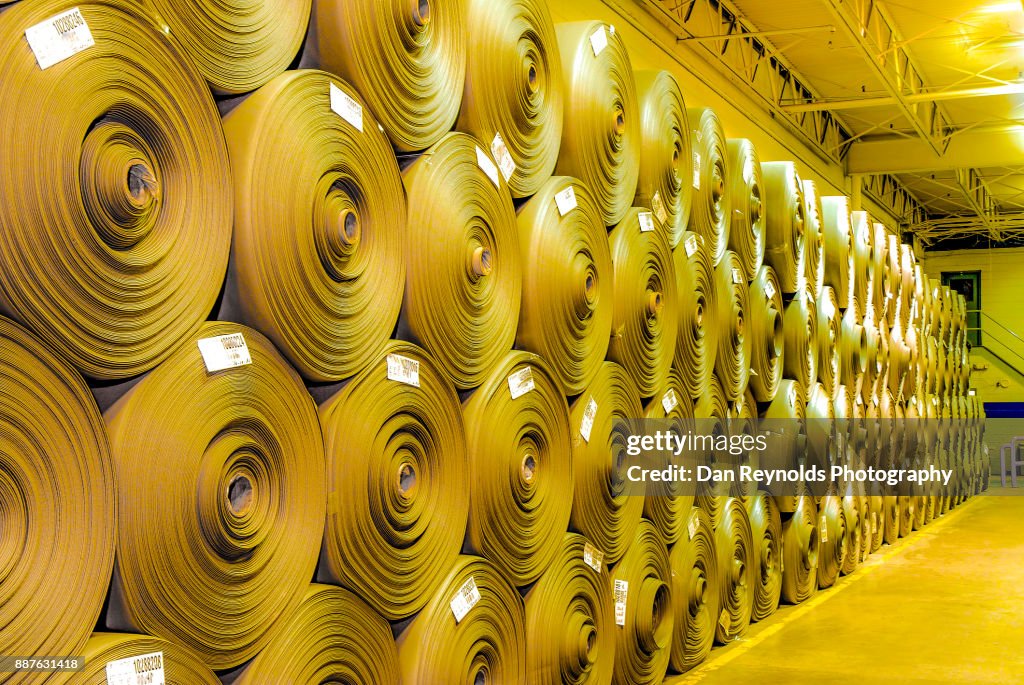 Stacked Carpet Rolls as Abstract