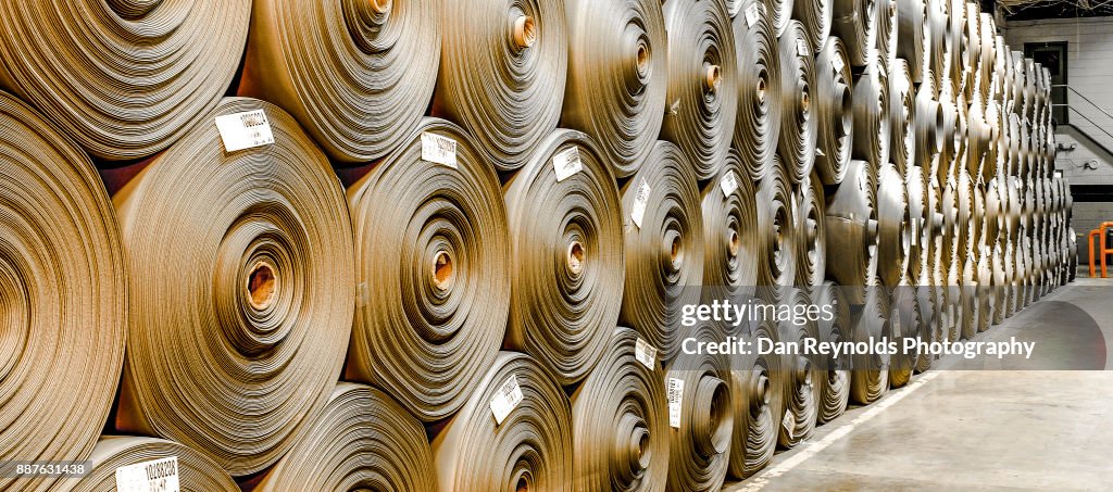 Stacked Carpet Rolls as Abstract