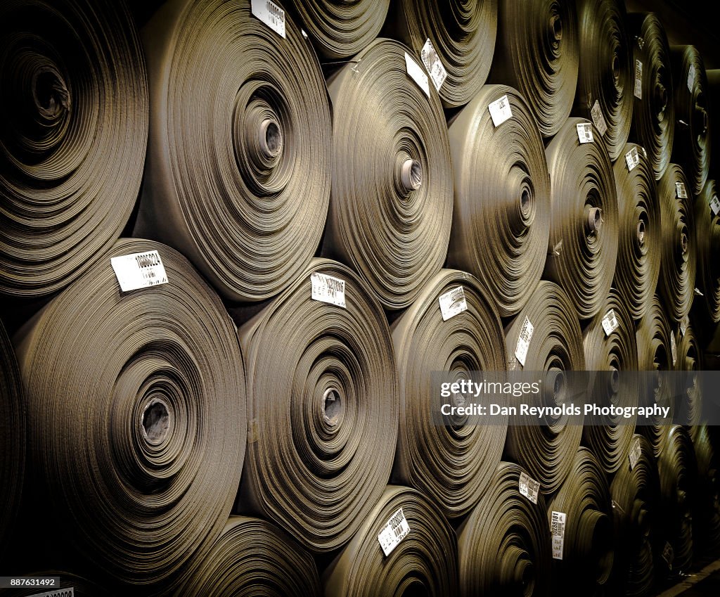 Stacked Carpet Rolls as Abstract