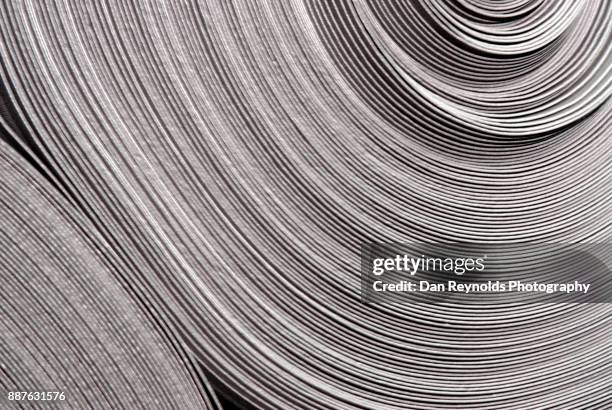 carpet roll as abstract - perspectiva de una cinta transportadora fotografías e imágenes de stock