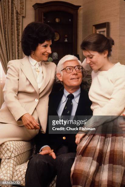In his brother's apartment, American politician US Congressman John B Anderson smiles at his daughter, Diane , while his wife Keke looks on, while on...
