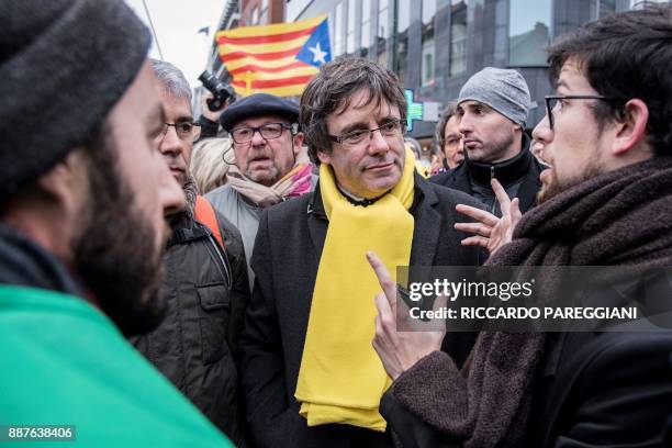 Catalonia's deposed regional president Carles Puigdemont attends a pro-independence demonstration on December 7, 2017 in Brussels. A sea of around...