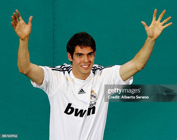 New signing Kaka waves to fans during his official presentation as a Real Madrid player at the Santiago Bernabeu Stadium on June 30, 2009 in Madrid,...
