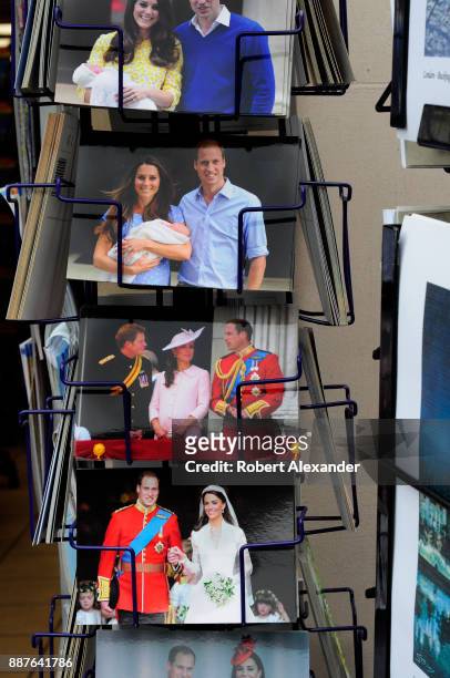 Rack of postcards at a souvenir shop in London, England, features postcards with photographs of Prince William and Kate Middleton, the Duke and...