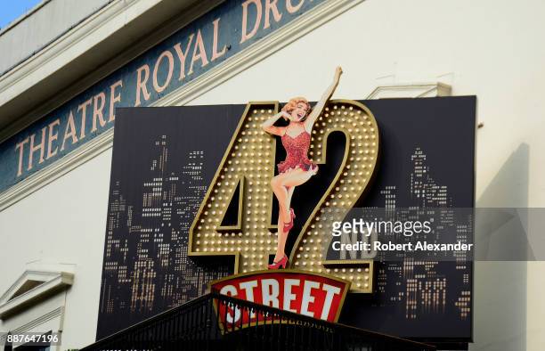 Sign in front of the Theatre Royal Drury Lane in London, England, advertises the theater's current show, the American musical '42nd Street'. The...