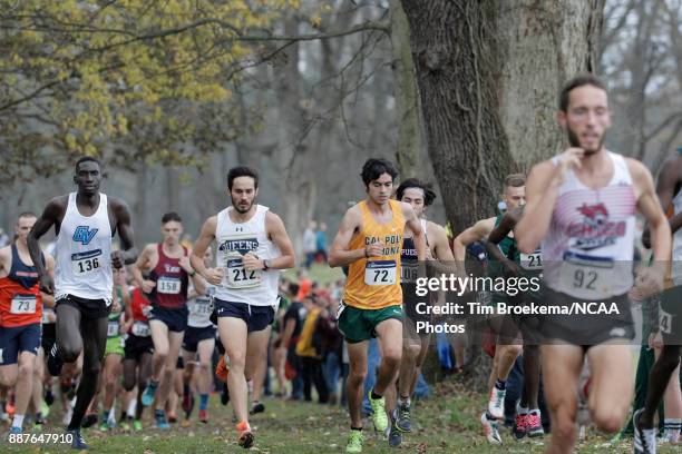 From left - Wuoi Mach of Grand Valley State University, Tom Bains of Queens University of Charlotte and Ruben Dominguez of Cal Poly Pomona compete in...