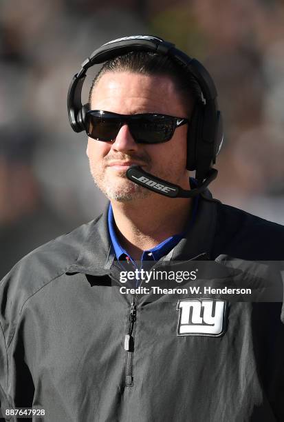 Head coach Ben McAdoo of the New York Giants looks on from the sidelines against the Oakland Raiders during their NFL football game at...