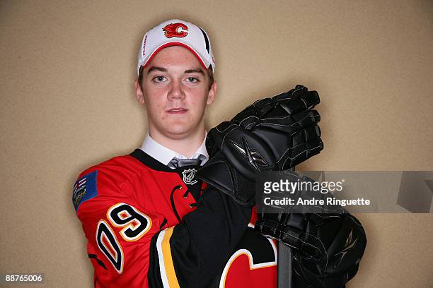 Tim Erixon poses for a portrait after being selected 23rd overall by the Calgary Flames during the first round of the 2009 NHL Entry Draft at the...
