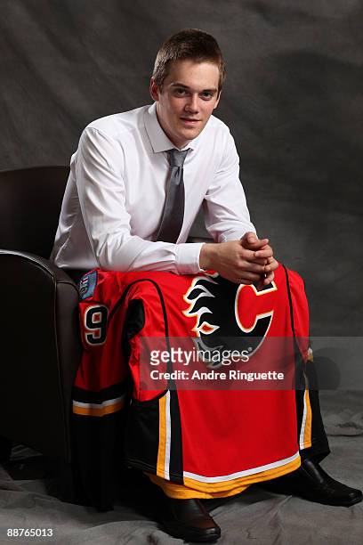 Tim Erixon poses for a portrait after being selected 23rd overall by the Calgary Flames during the first round of the 2009 NHL Entry Draft at the...