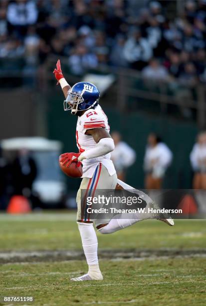 Landon Collins of the New York Giants celebrates after recovering a fumble by Johnny Holton of the Oakland Raiders during their NFL football game at...