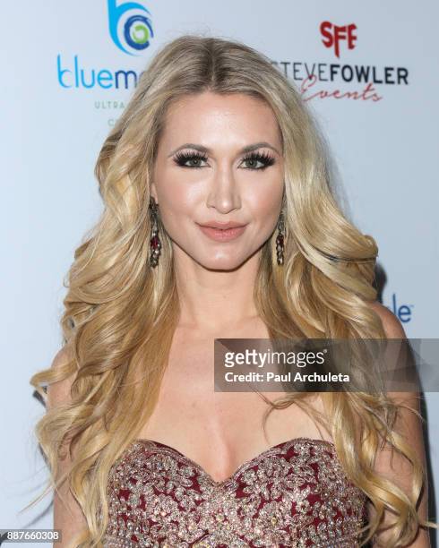 Model / TV Personality Andrea Lowell attends the 10th annual Babes In Toyland charity toy drive at Avalon on December 6, 2017 in Hollywood,...
