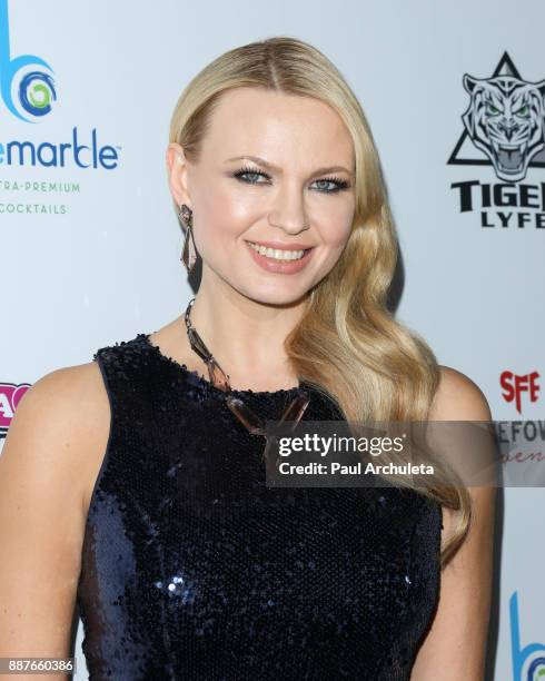 Model / Playboy Playmate Irina Voronina attends the 10th annual Babes In Toyland charity toy drive at Avalon on December 6, 2017 in Hollywood,...